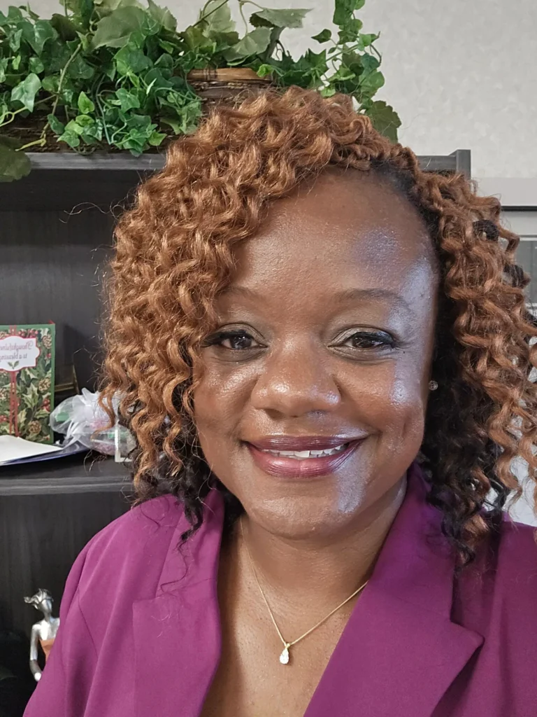 Smiling client with short honey-blonde crochet curls — Crochet Braids