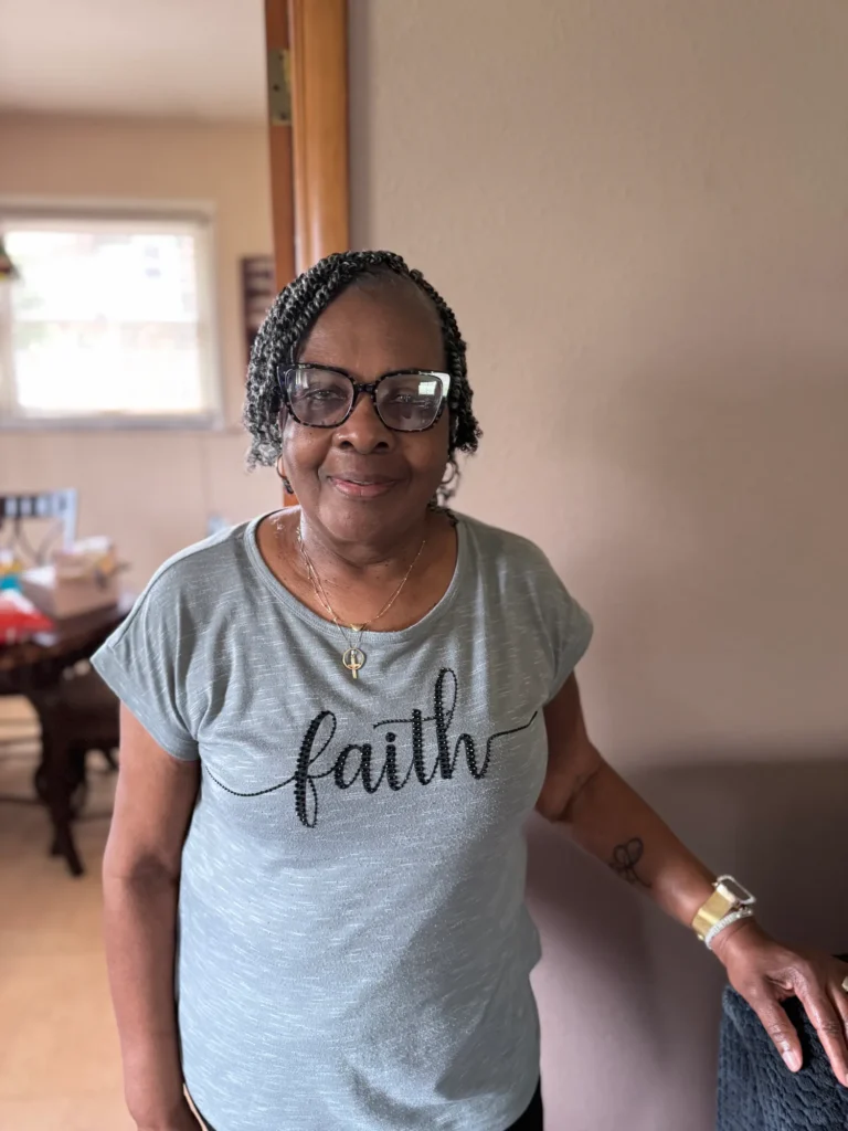 Client wearing a short natural braided style — Natural Cornrow Styles