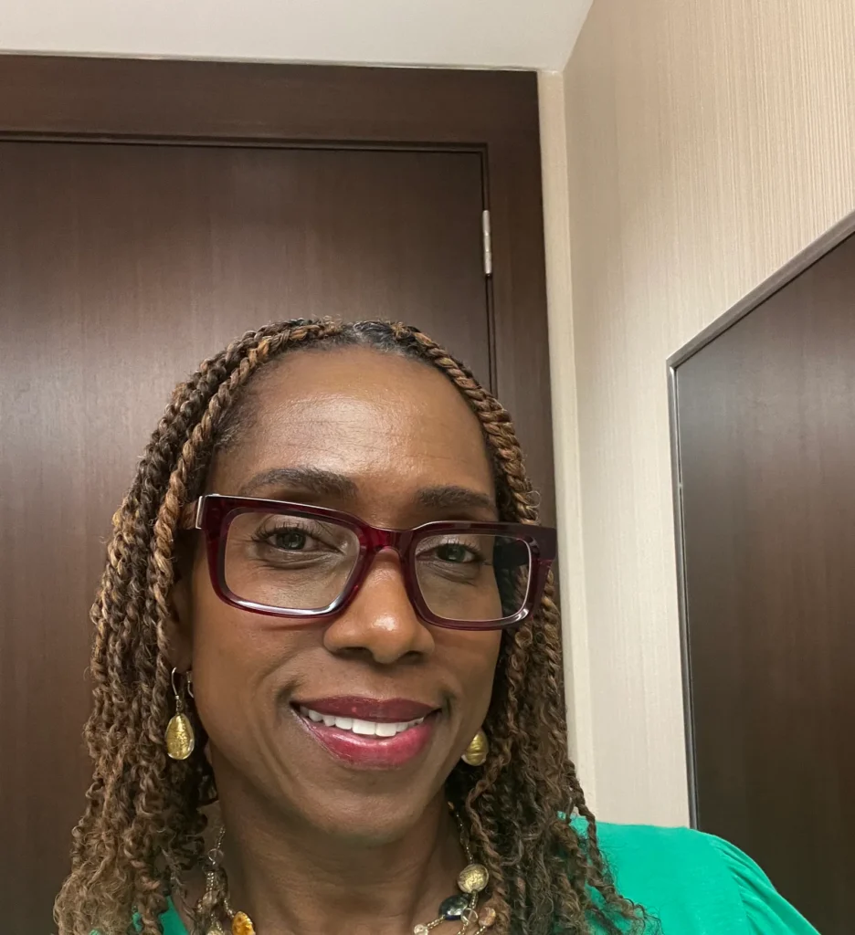 Client with shoulder-length natural twists and a side part — Natural Cornrow Styles